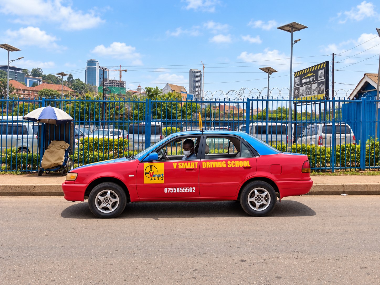 Wide side view of VSMART driving school training car